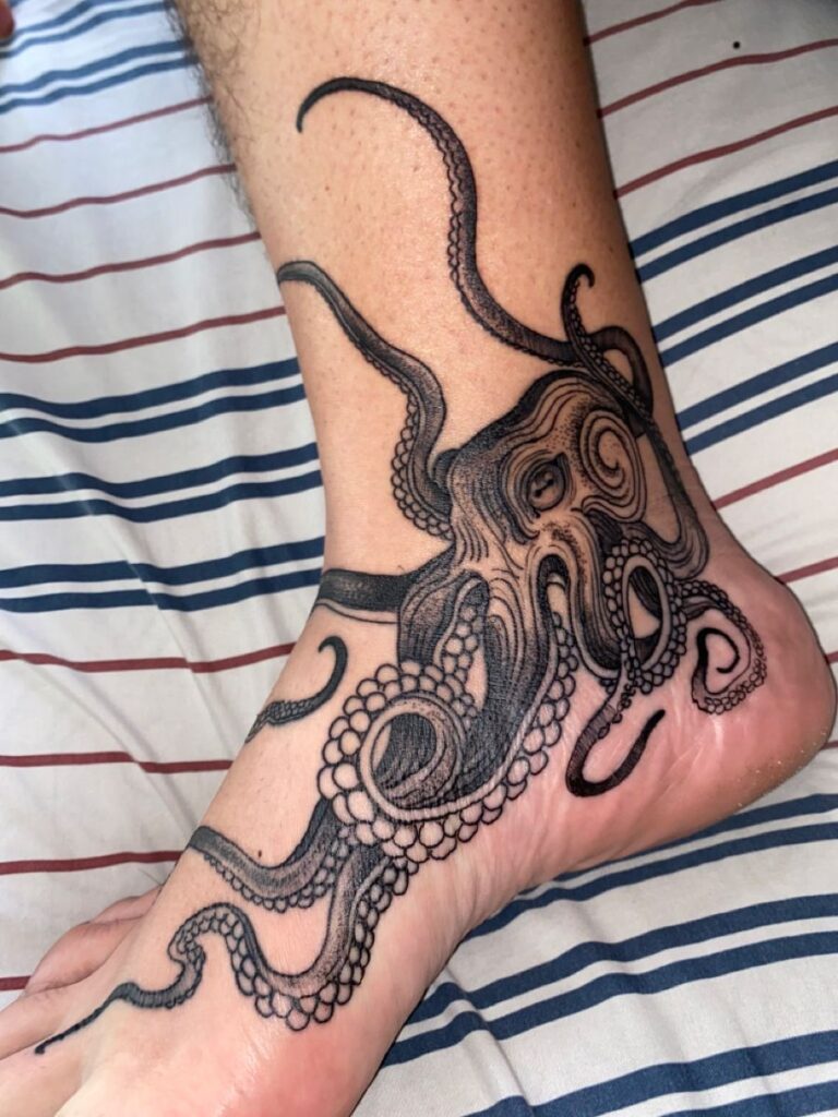 Grey Ink Octopus Tattoo On Side Thigh